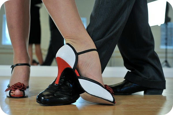 a man and woman dancing
