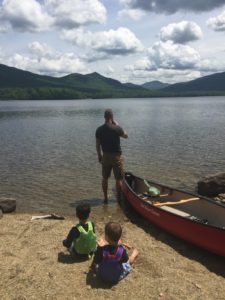 man, kids on a lake, canoe, summer