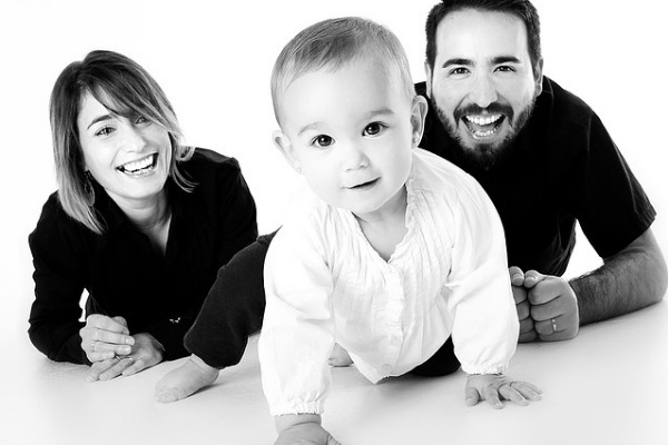 Snowplow Parents – Clearing Away All Obstacles on the Path to Success baby and two parents