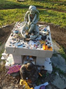 altar with coins and offerings