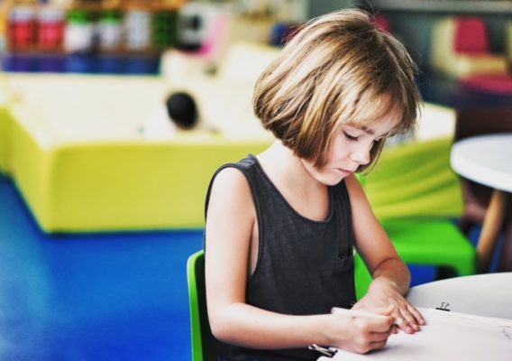 girl working at a table