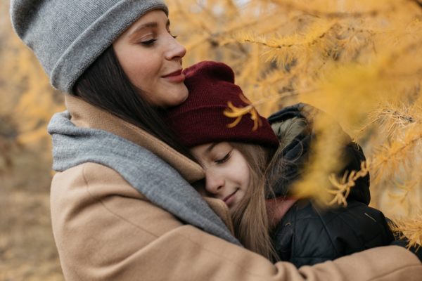 mother and daughter hugging