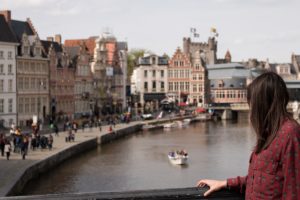 woman looking over big city