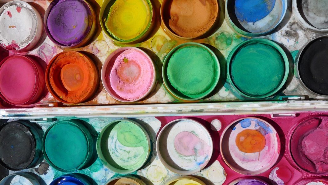 “But the Mess!” Making Art with Young Children A watercolor paint palette viewed from above