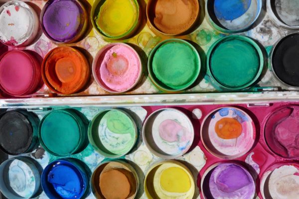A watercolor paint palette, viewed from above.