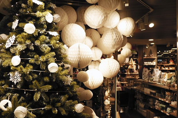 Christmas overload at a store; Christmas tree, ornaments, paper lanterns