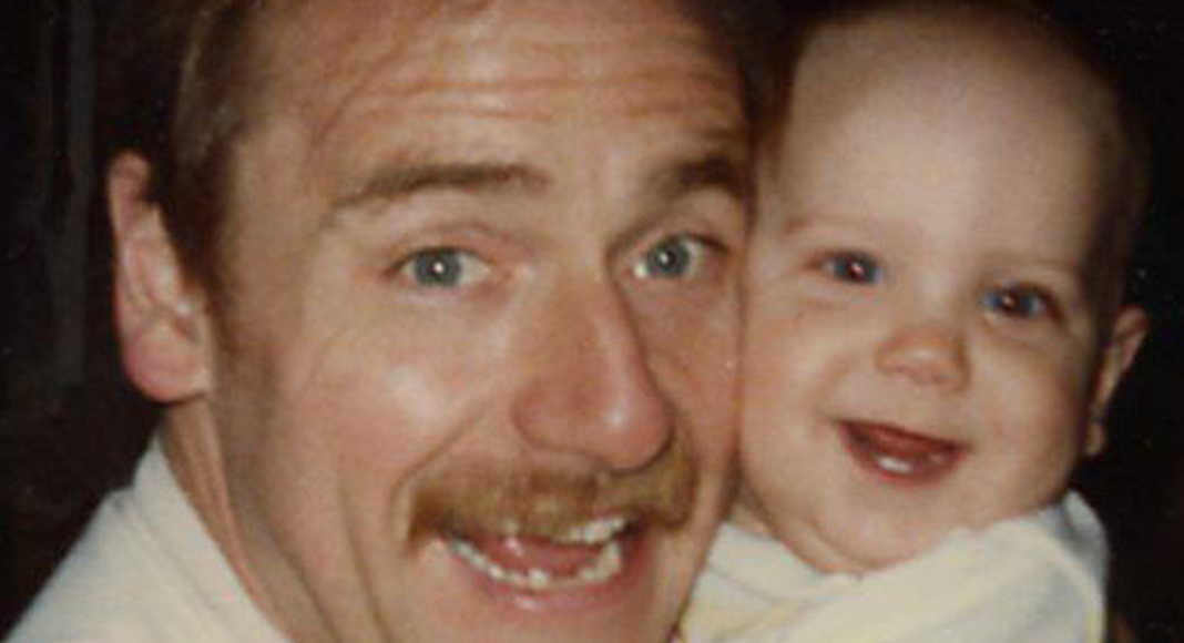 Grief Acceptance: The Final Stage Is Different than You Think father holding daughter as baby