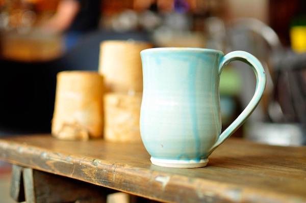 ceramic mug and candles