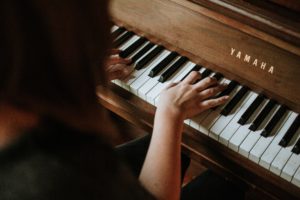 playing music on a piano