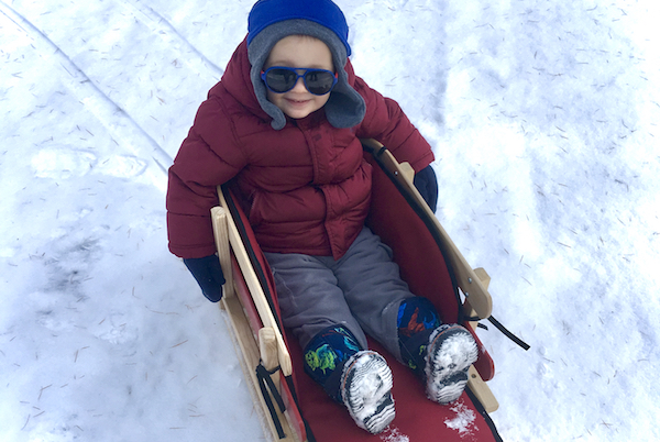 child sledding