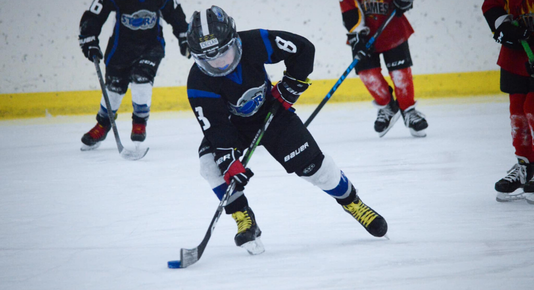 This is Why an Intensive Hockey Schedule Works for My Son hockey mom featured image