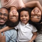 family on bed