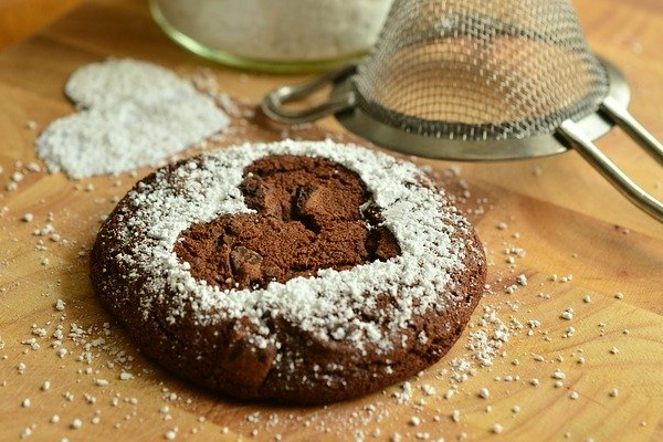 a chocolate cookie with a heart on top