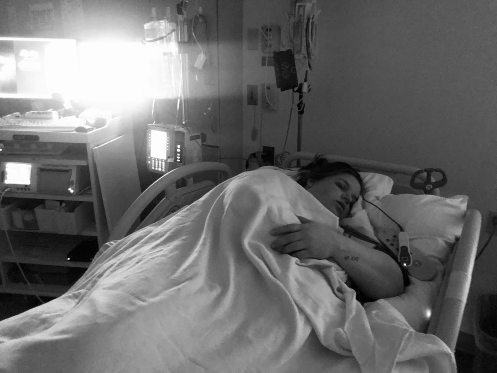 Woman in a hospital bed in labor
