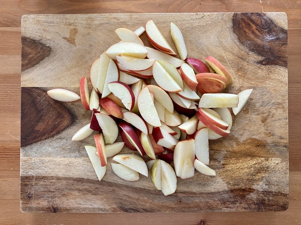 sliced apples on a cutting board