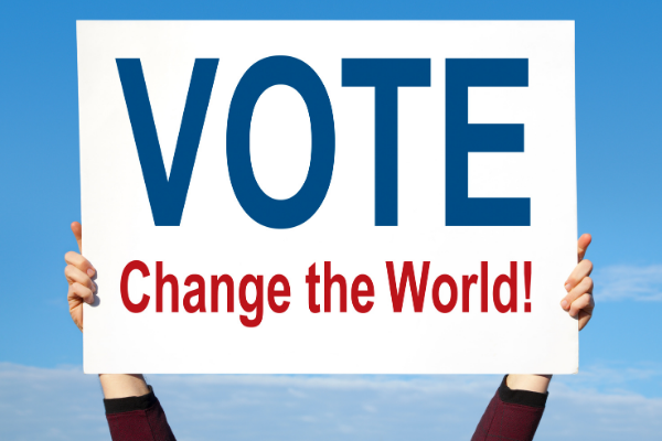 sign that says "vote change the world"