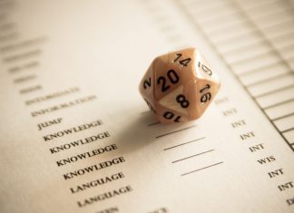 Talk Nerdy to Me: How Role Playing Games Made My Marriage Fun Again A 20 sided dice on a character sheet for role playing games