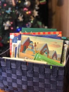 books in a bin to read aloud to kids 