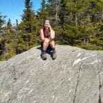 Mario sitting on a rock