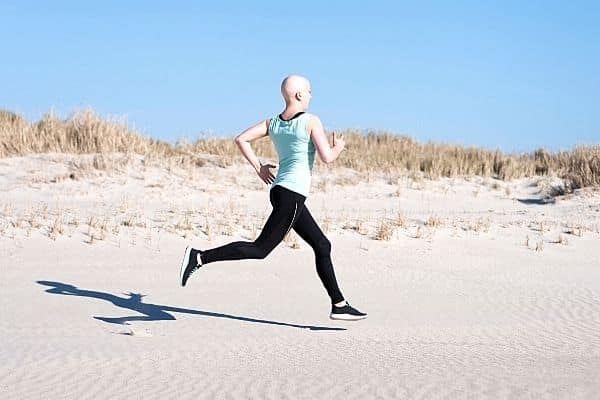 bald woman running