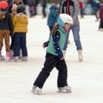 girl ice skating outdoors
