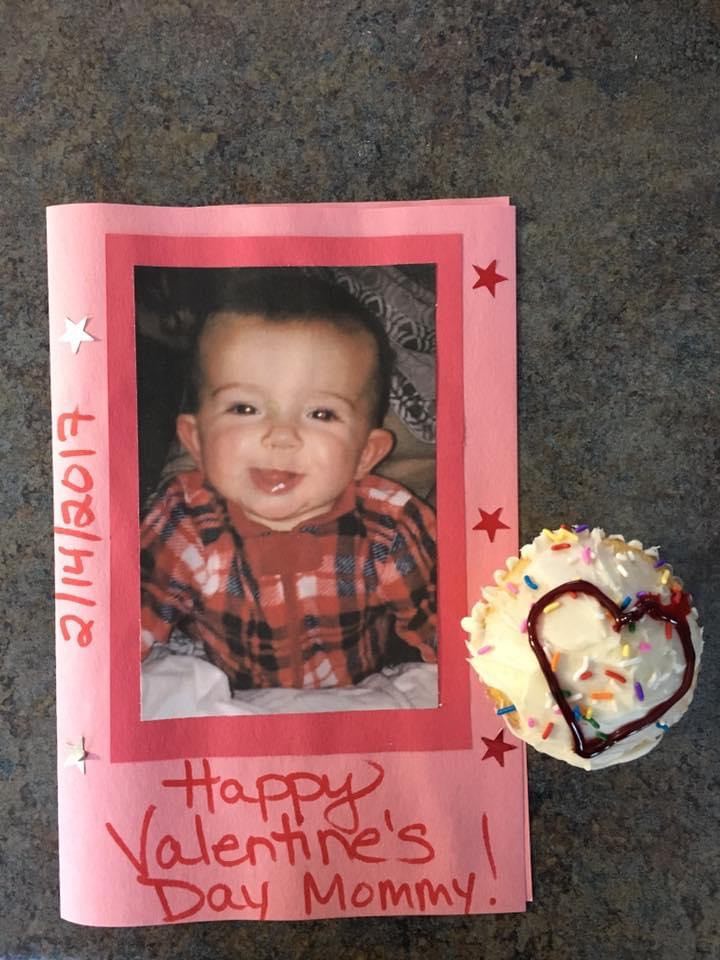Pink and red Valentine's Day card with a photo of a baby