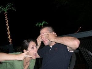 man and woman make faces at the camera