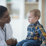 autistic child talking with doctor