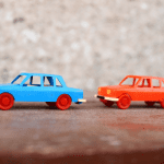 toy cars in a line