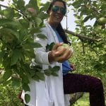 Nan’s daughter picking apples