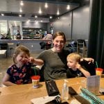 Kelli and kids at a restaurant