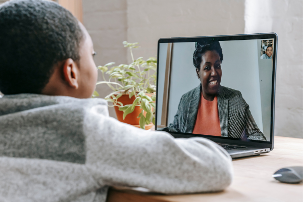 teacher shown on computer screen