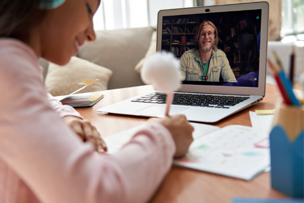 male teacher conducts class via Zoom