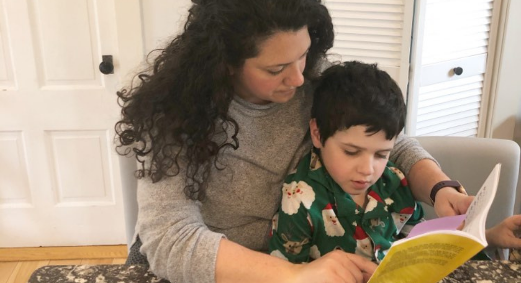 mother reading with her son