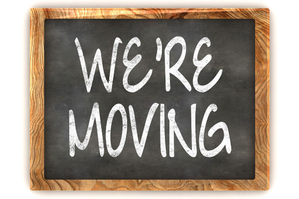 "we're moving" sign