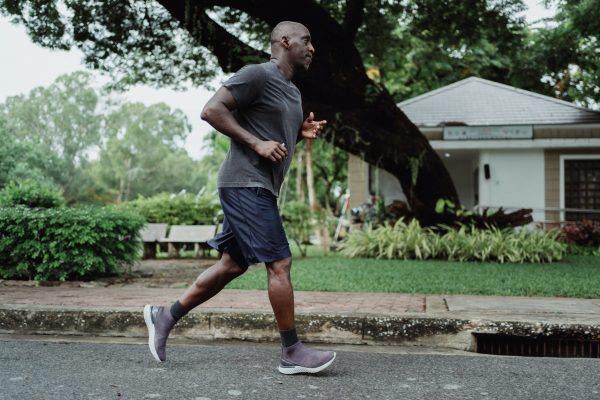 Black man jogging