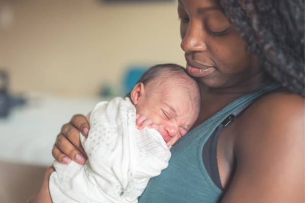 Woman holding newborn