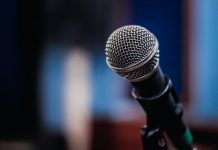Disabled Enough: The Thing About #FreeBritney That Bugs Me A photograph of a microphone against a blurred background
