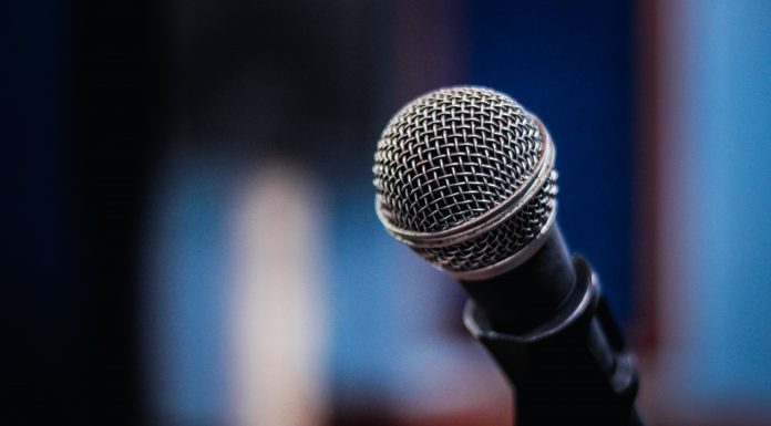 Disabled Enough: The Thing About #FreeBritney That Bugs Me A photograph of a microphone against a blurred background