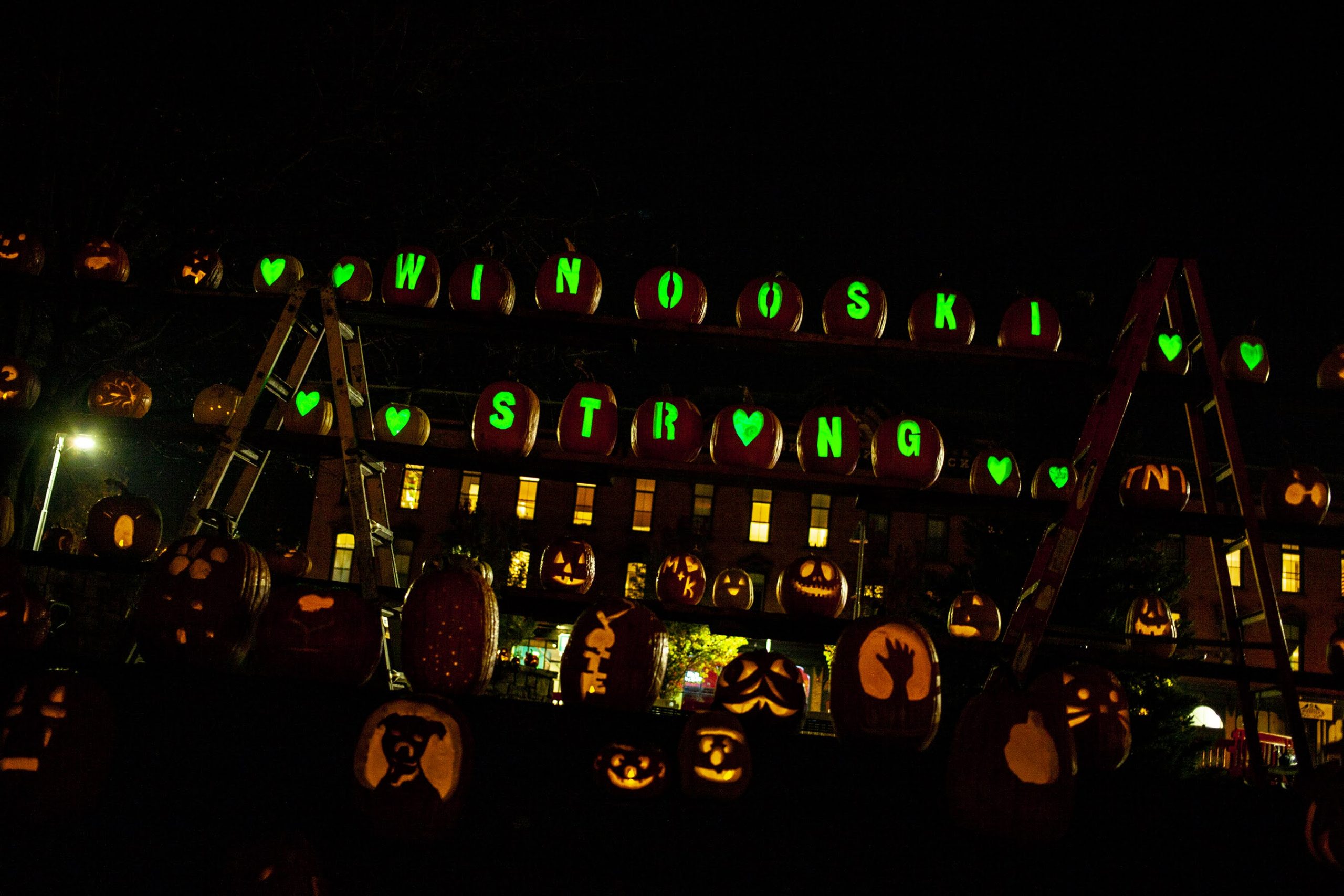 Jack-o-lanterns spelling out "Winooski Strong"