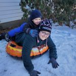 brianna mom sledding with son
