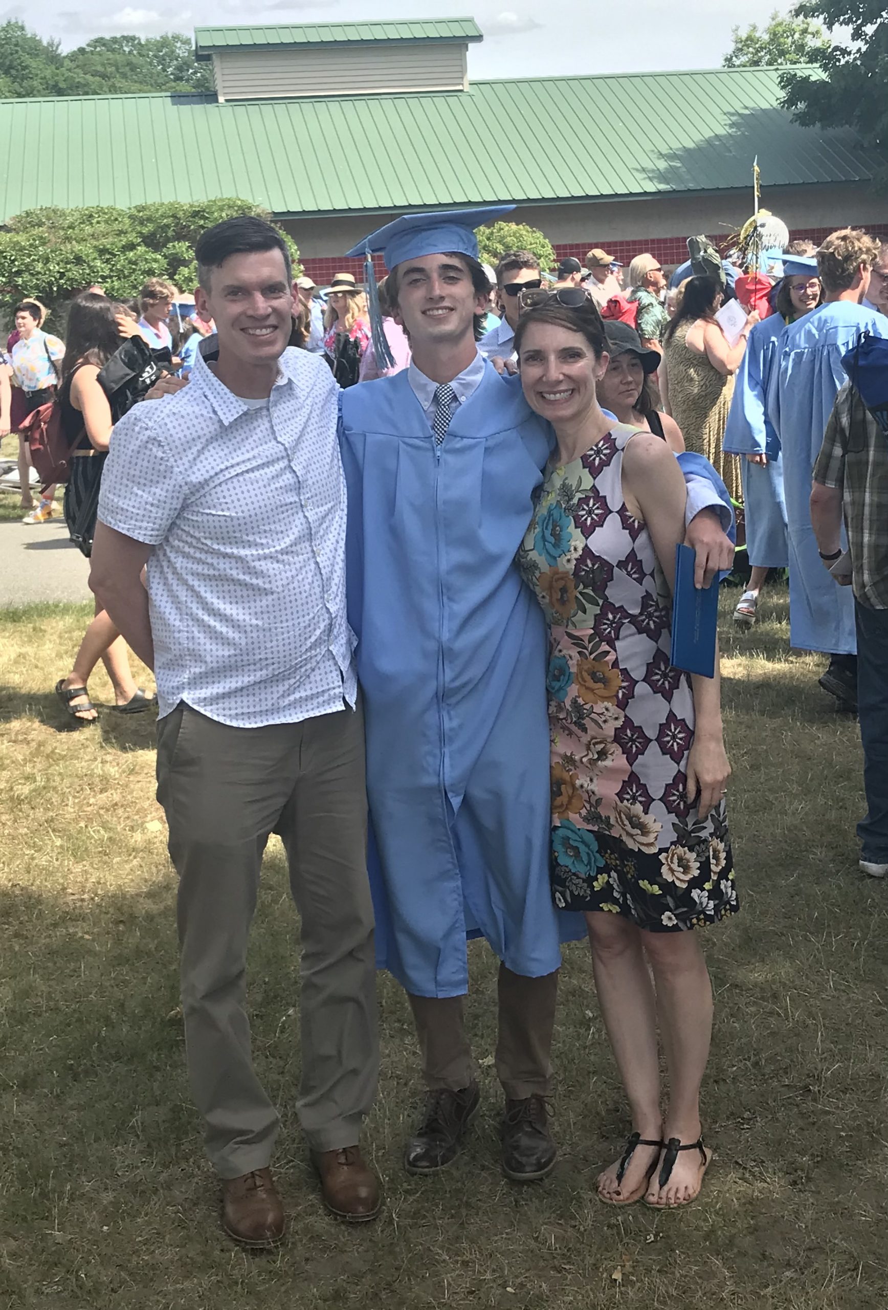 family at son's high school graduation