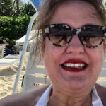 jemima on beach smiling