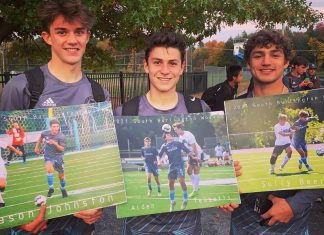 Hey There, Moms of High School Seniors Three boys stand in a line after a soccer game, sweaty and happy, holding pictures honoring them for Senior Night.