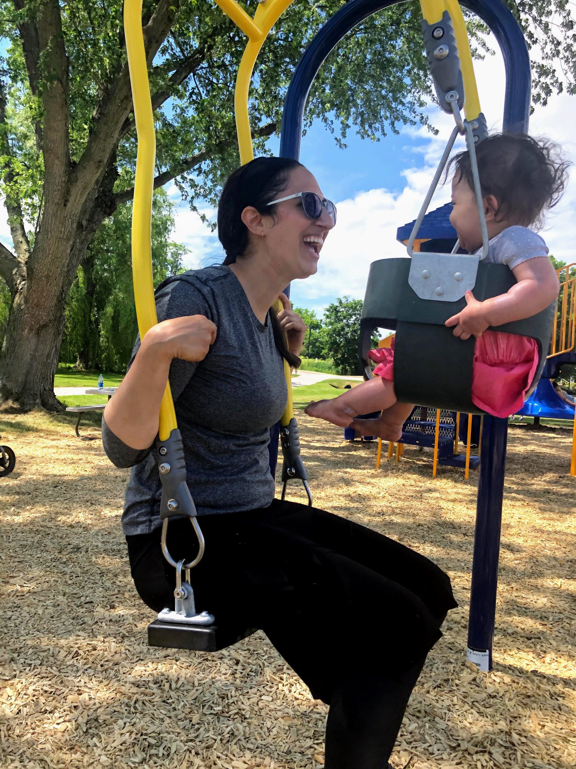 IMG_5282 Hasidic Jewish woman laughing on the swing with her baby