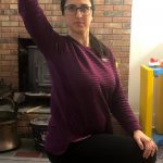 Half kneeling hip flexor stretch with a twist