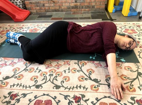 Sidelying rotation Woman does a side-lying exercise
