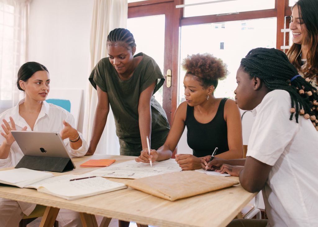 women at a meeting