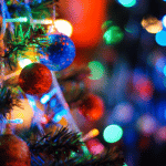 colored lights and bulbs on a Christmas tree