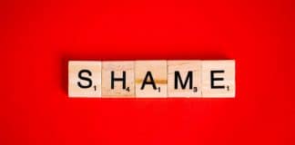 How I Am Combatting the Stress-Shame Cycle in My Marriage Scrabble letters spelling the word "shame" on a red background.